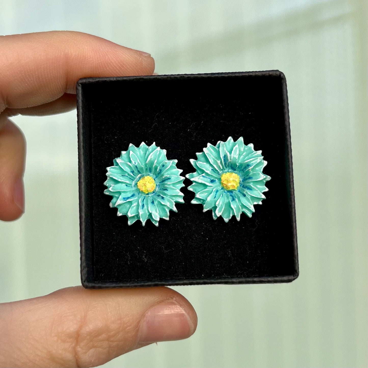 Blomster ørestikker